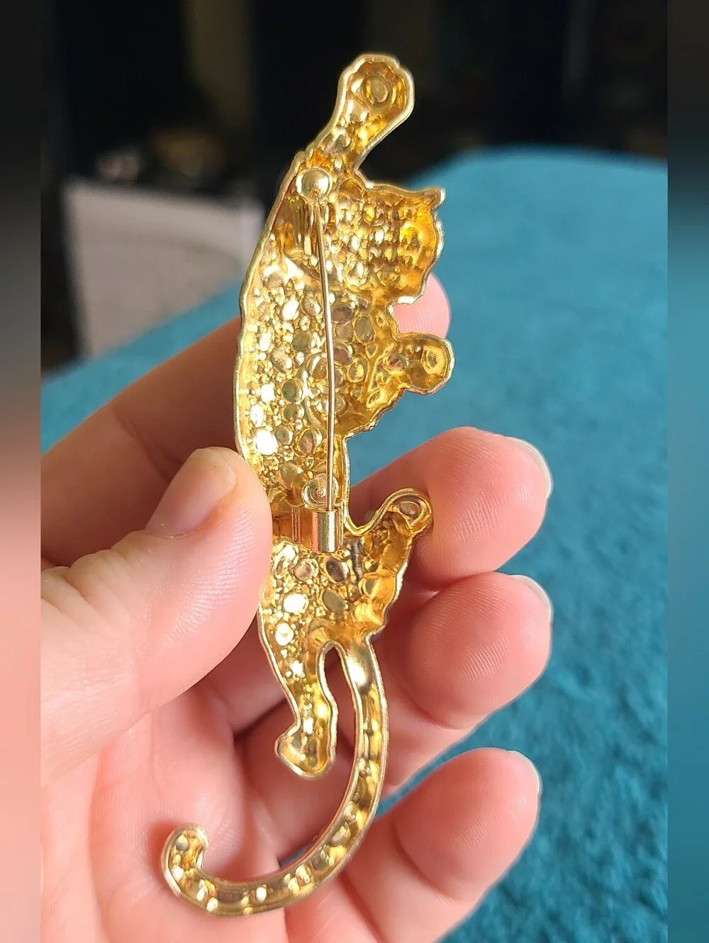 Vintage Gold-Tone Black and Clear Leopard Brooch with Green Eyes
